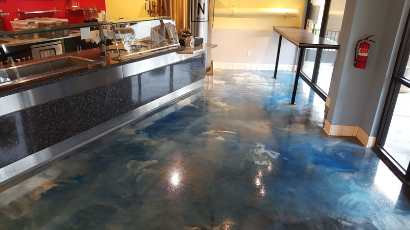 Photo of a floor after a Roll on Rock epoxy finish is applied