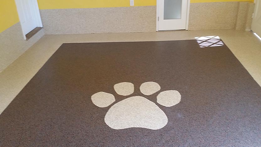 Image of custom epoxy floor with paw icon